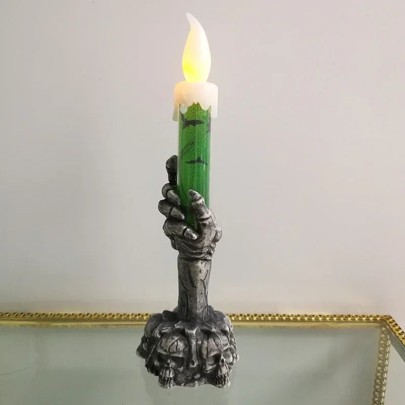 Bougie LED main de squelette Halloween verte gros plan